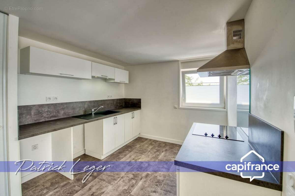 PÉRIGNY (17) – Élégant T3 modulable avec grande terrasse couverte & parking sous-sol - photo 6