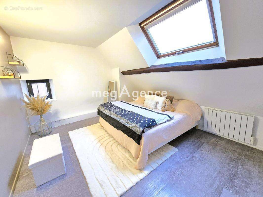 Maison de 4 pièces de 102m² - photo 7