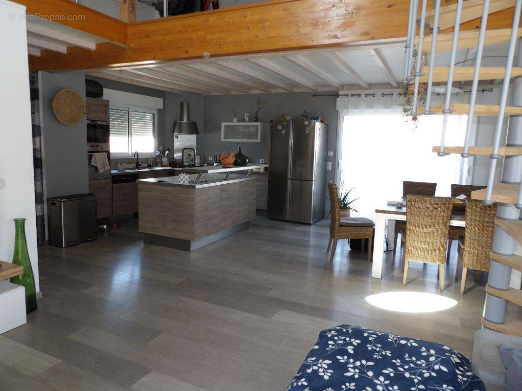Maison de plain-pied lumineuse avec mezzanine et jardin au c - photo 3