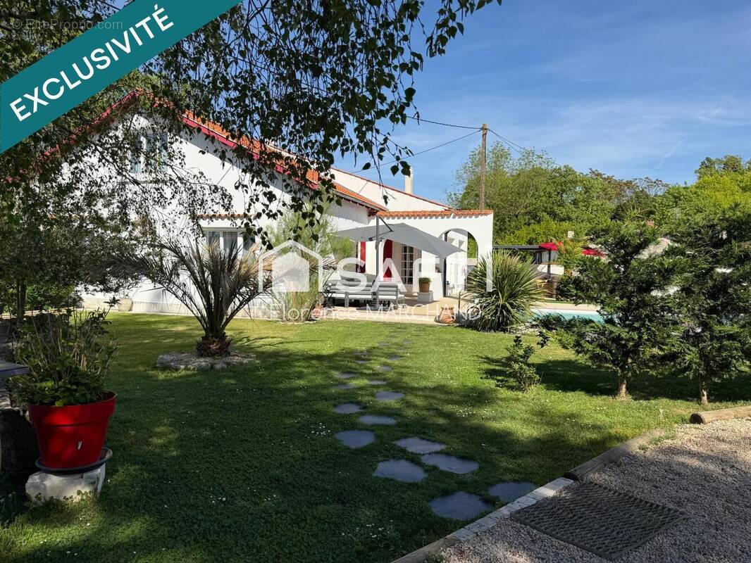 Photo 1 - Maison à AIGREFEUILLE-D'AUNIS