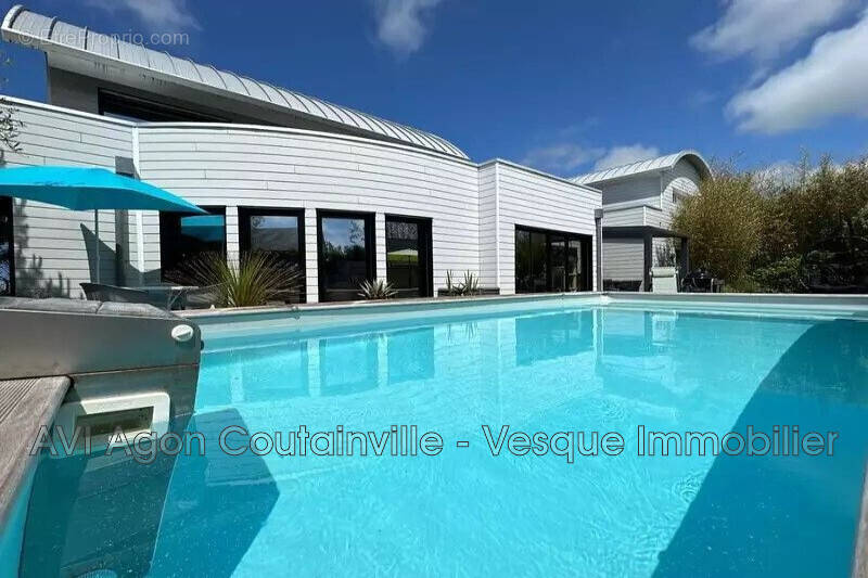 Maison à AGON-COUTAINVILLE