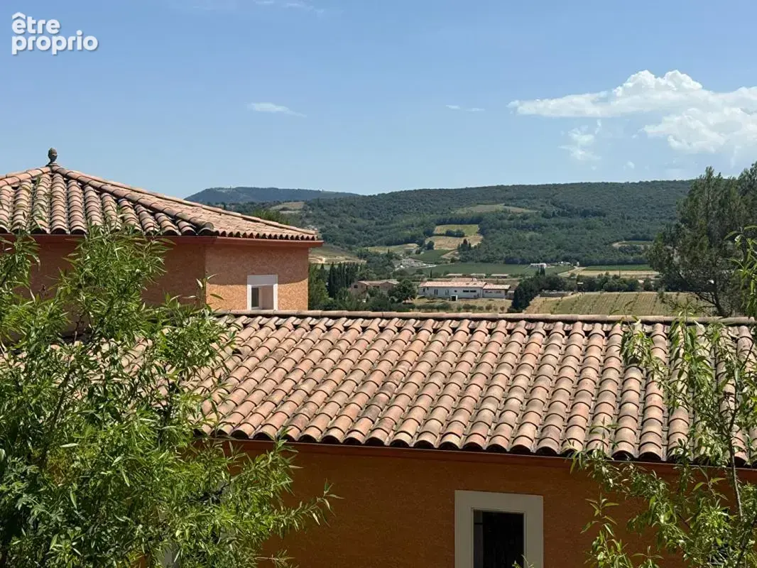 LIMOUX Maison de plain pied avec plafond cathédrale vue dégagée garage cave et terrain de près de 2400 m² - photo 4