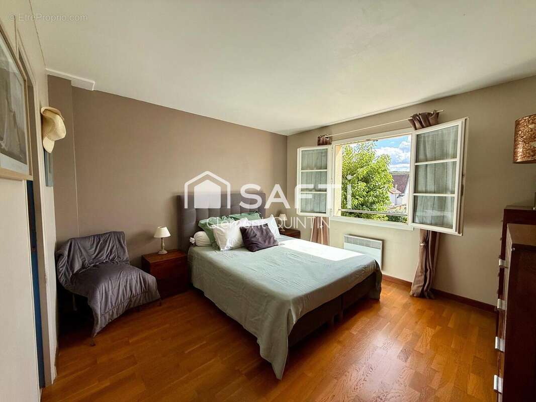 Photo 8 - Maison à LES CLAYES-SOUS-BOIS