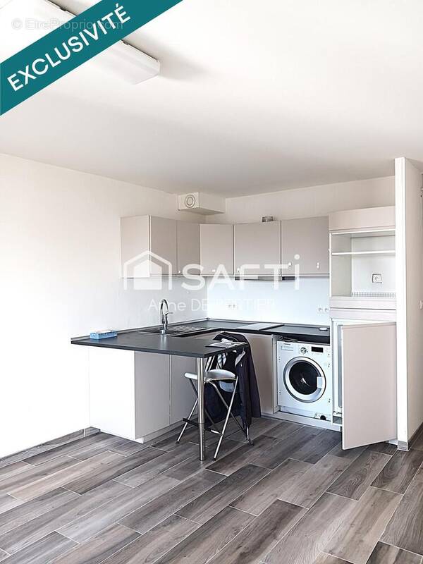 Photo 1 - Appartement à PARIS-17E