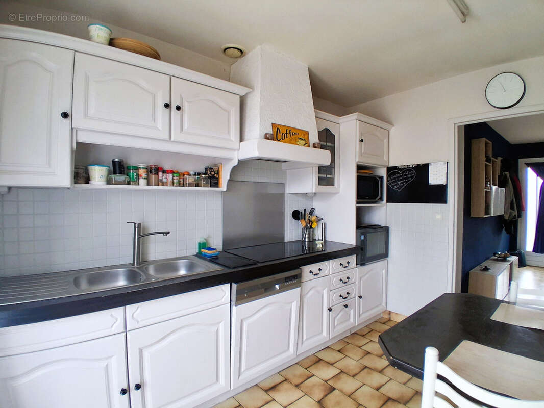 Maison sur sous sol avec garage et jardin - photo 4