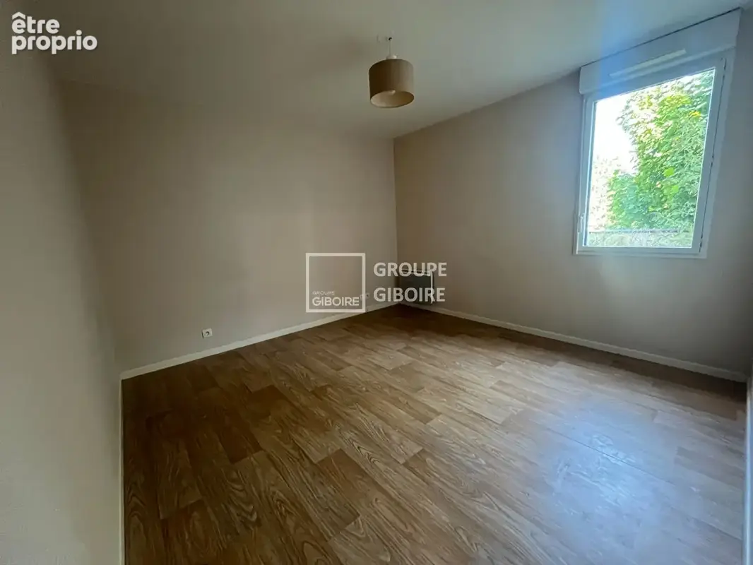 GROUPE GIBOIRE - Appartement 3 pièces à vendre à Rennes Poterie - Résidence récente avec garage - photo 4