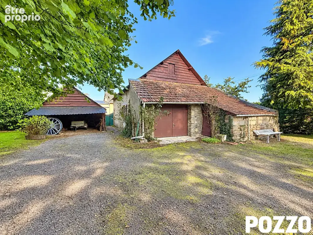 Poilley ? maison en pierre avec dépendances et terrain arboré - photo 4