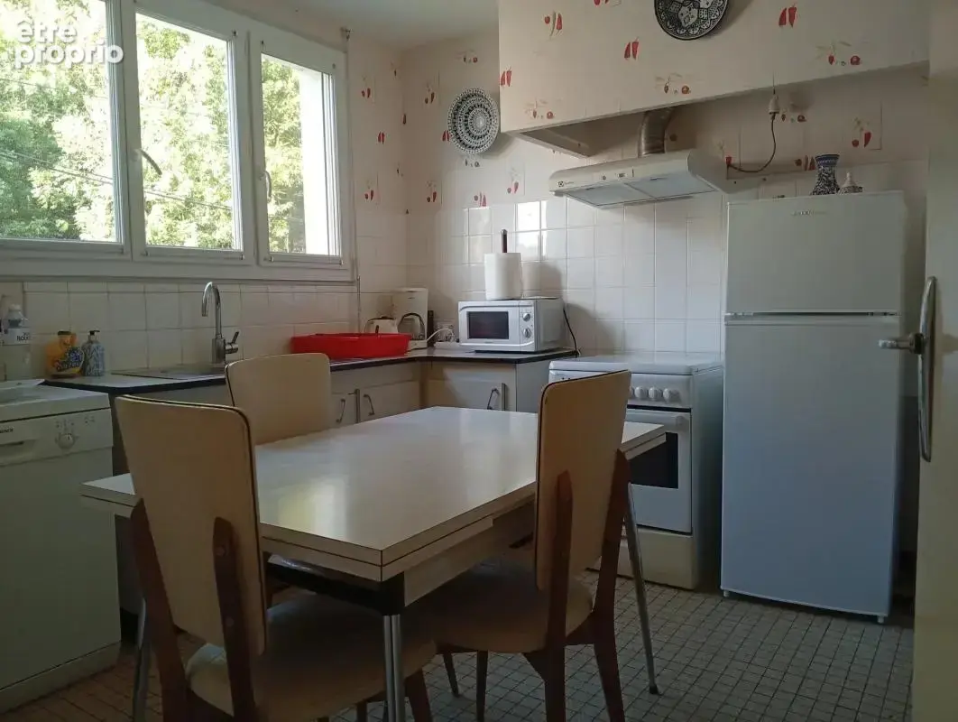 Maison mitoyenne de 85m² avec jardin et sous-sol - photo 2
