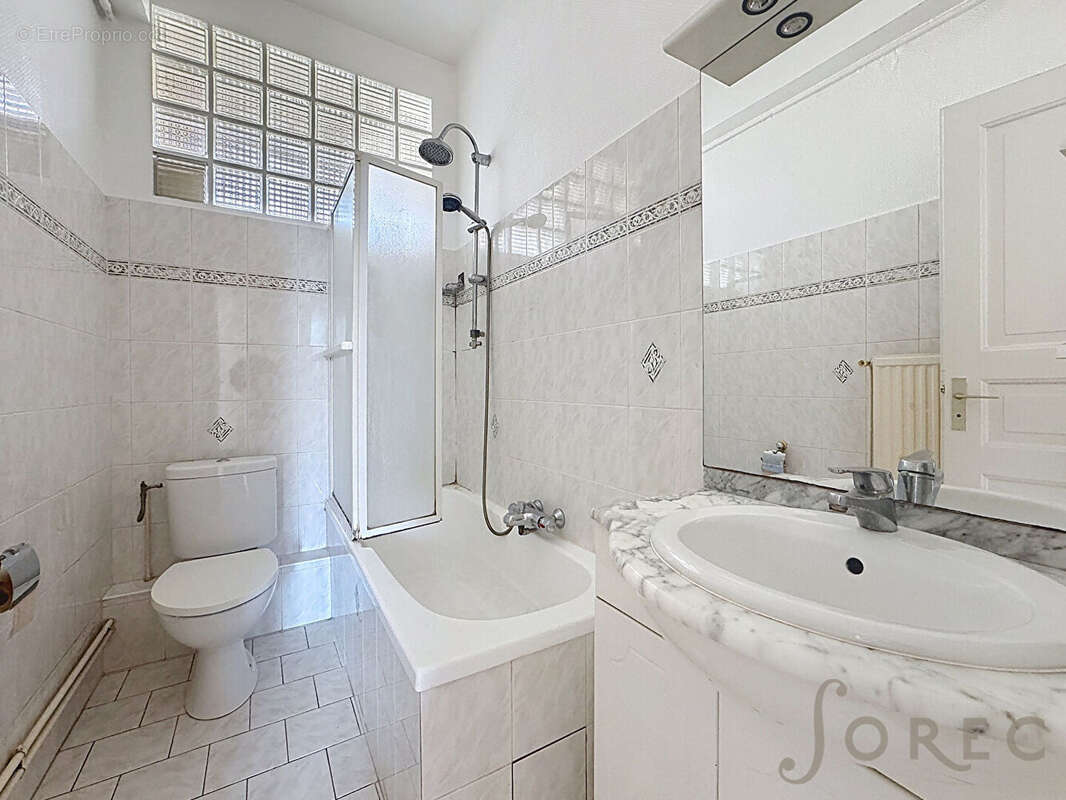 Appartement F4 de caractère avec balcon à proximité immédiate de la Gare - photo 7