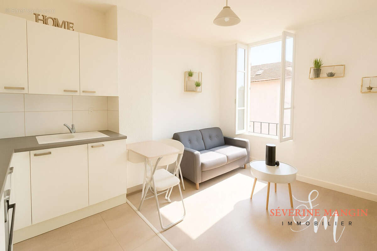 pièce de vie - Appartement à ROMANS-SUR-ISERE