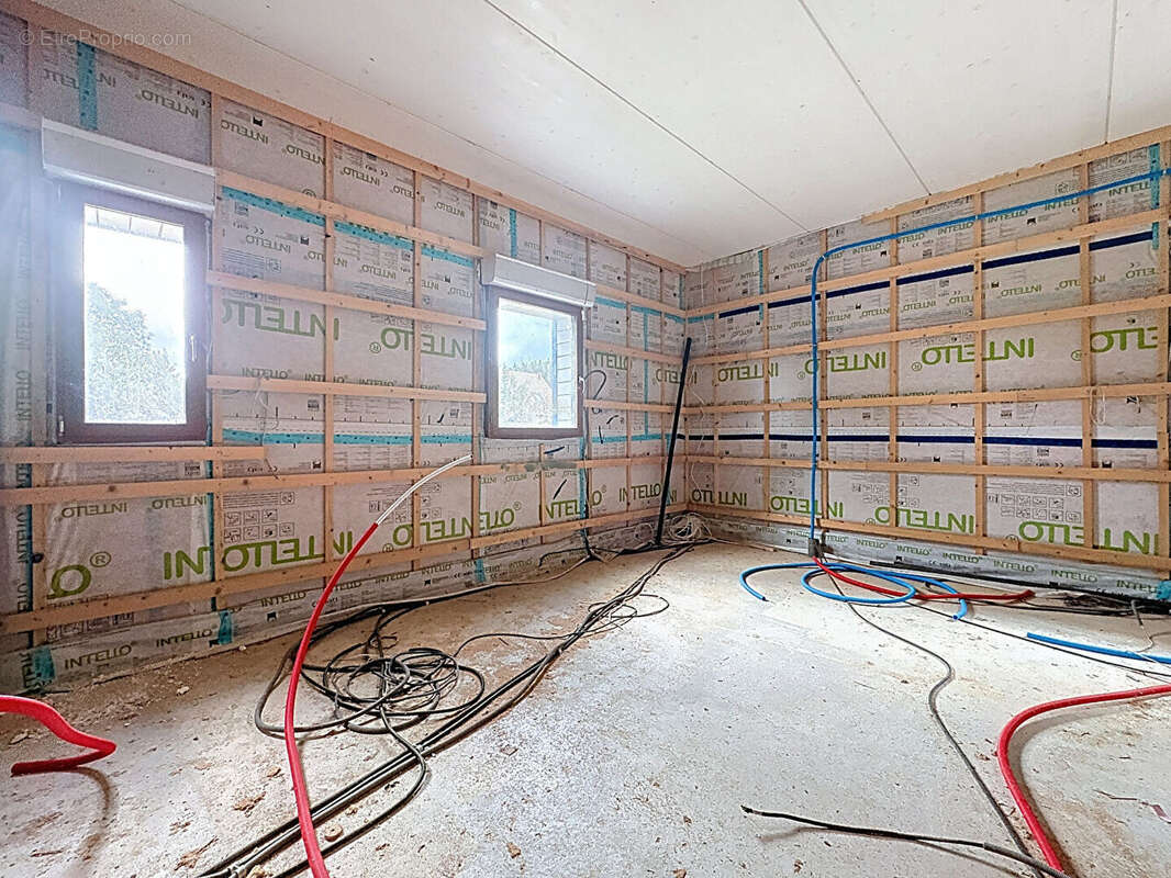 Grande maison à ossature et bardage bois - photo 7