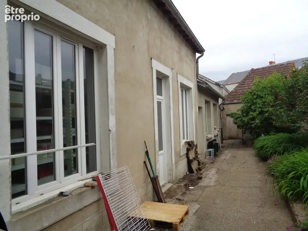 Immeuble a usage mixte avec habitation et commerce - photo 9