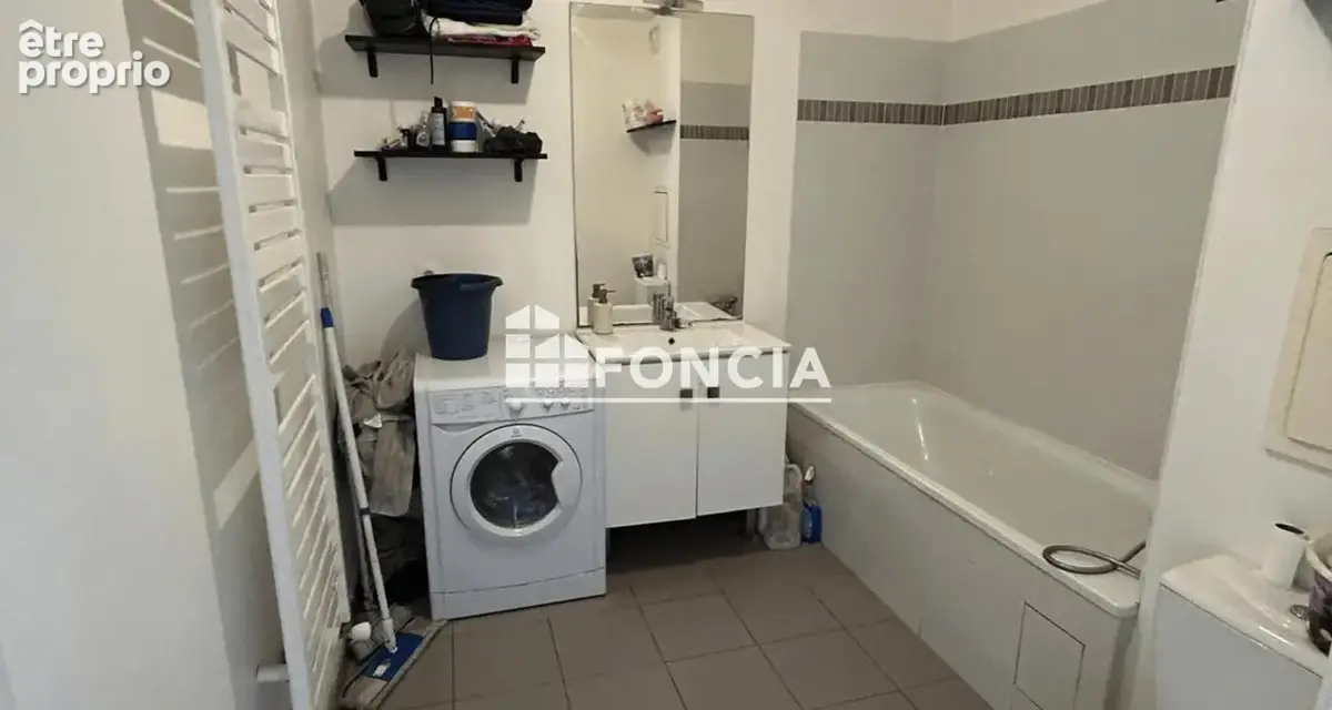 T3 56M2 Séjour, 2 chambres , balcon et place de Parking - photo 6
