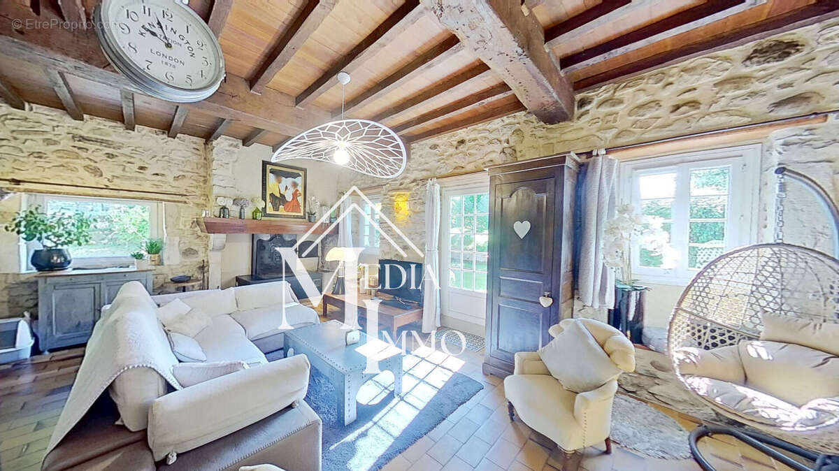 Maison à GAN