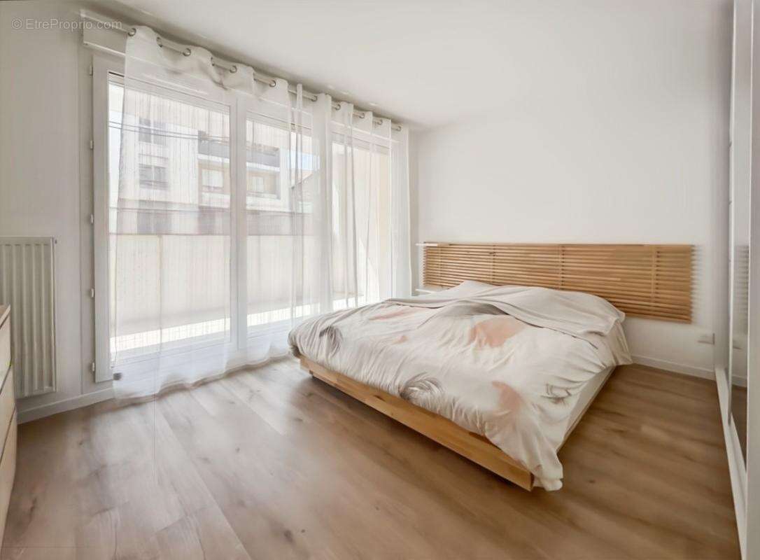 Appartement 3 pièces de 71 m2 avec jardin et 2 places de stationnement en sous-sol - photo 3