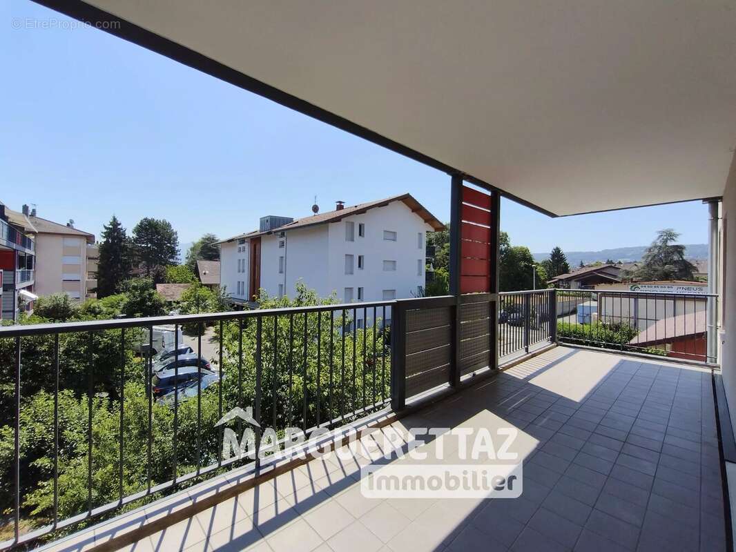 Au coeur de Reignier, T3 avec terrasse au calme + 2 places de parc en sous-sol et cave - photo 10