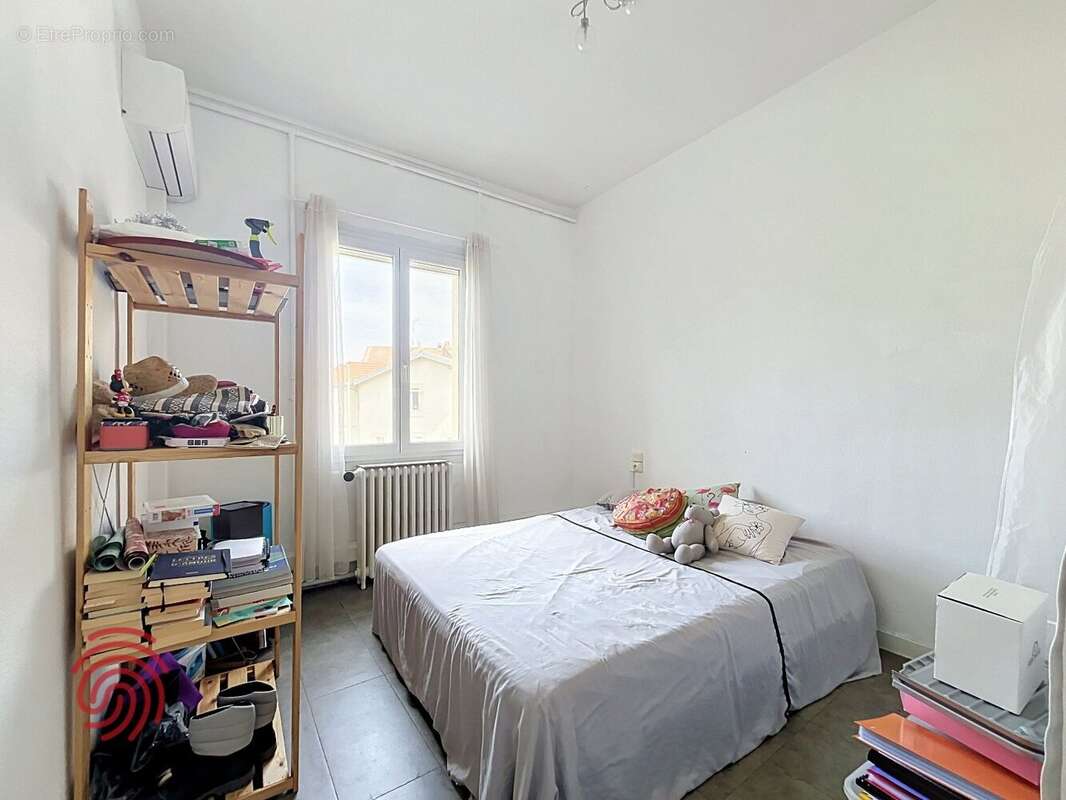 Béziers, proche du centre-ville  T3 lumineux de 70 m² avec climatisation et cave - photo 4