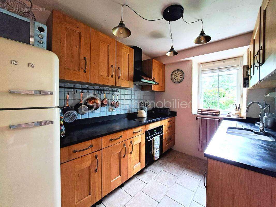 Maison 75 m² à Berrien  - photo 9