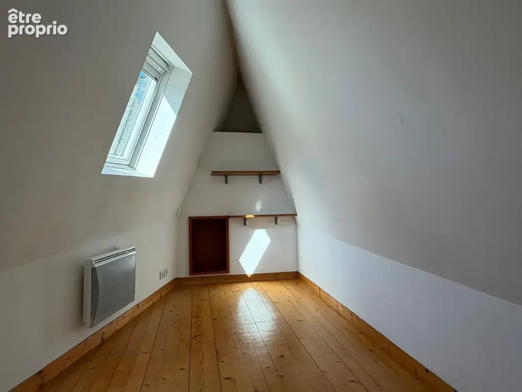 Chaleureux 3 pièces en duplex au Centre-Ville ! - photo 7