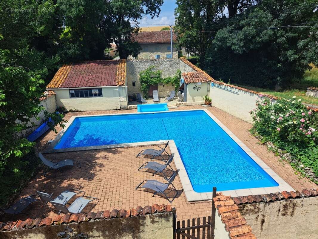 20230619_144206.jpg - Maison à SAINT-PIERRE-DE-JUILLERS