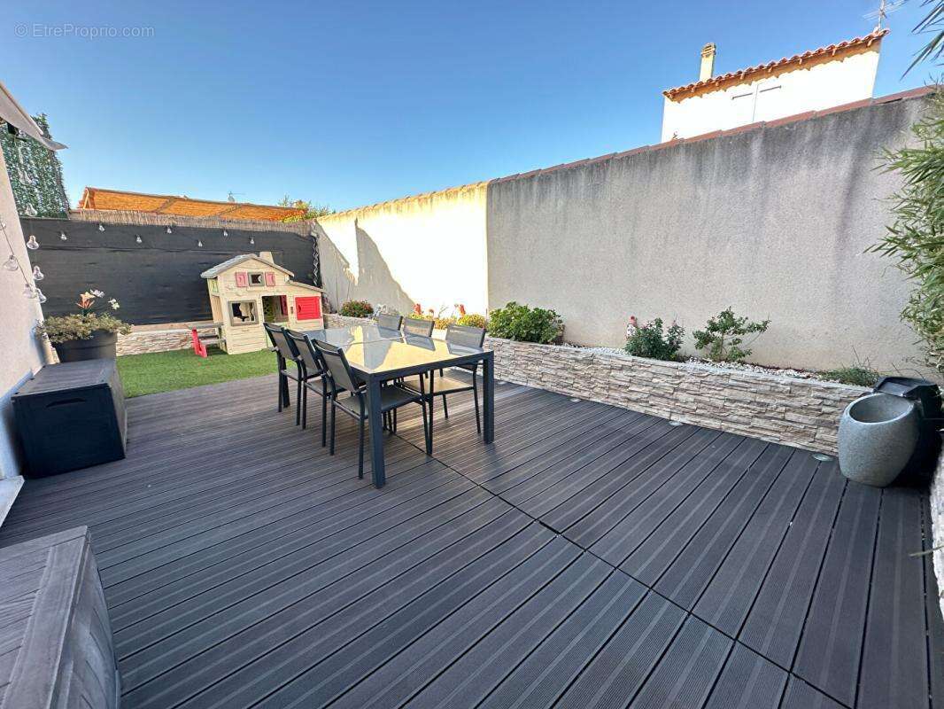 MARIGNANE - Pavillon T3 récent avec jardin, parking et prestations de qualité - photo 10