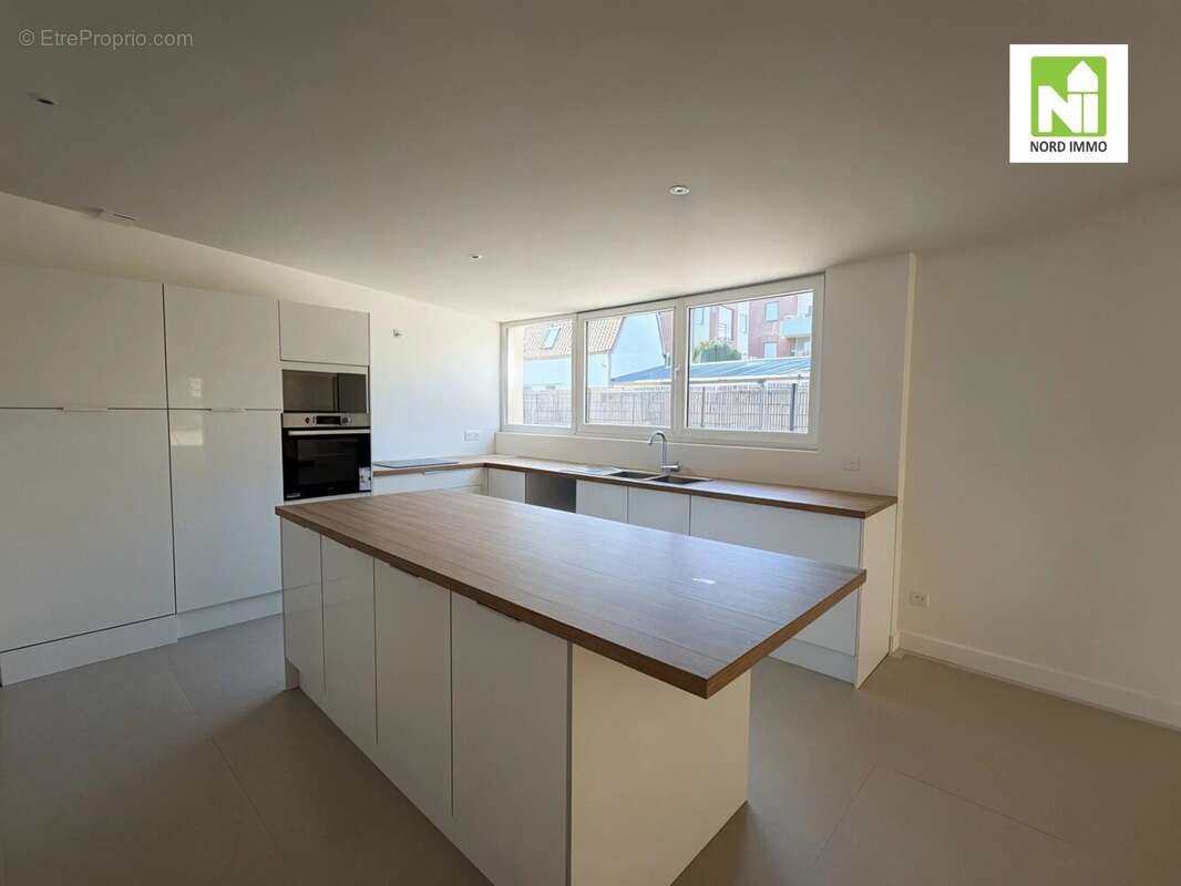 Maison semi plain pied 140m2 - Pont-à-Marcq - T4 - photo 5