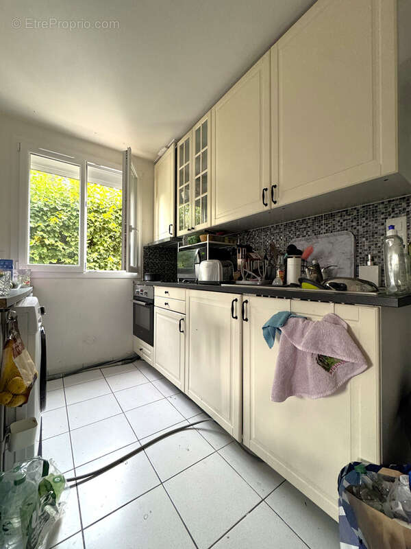 Appartement de 3 pièces en duplex à proximité de la Mairie et de la gare RER B - photo 4