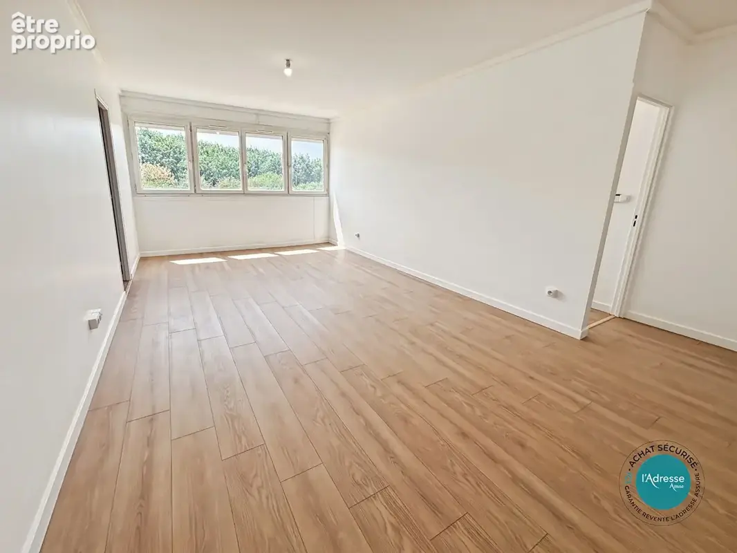 Appartement 4 pièces au pied des commerces et écoles - photo 2