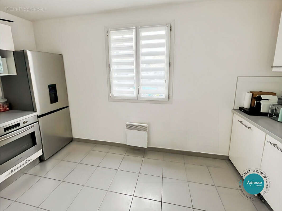 Maison mitoyenne avec 2 chambres jardin et garage - photo 4