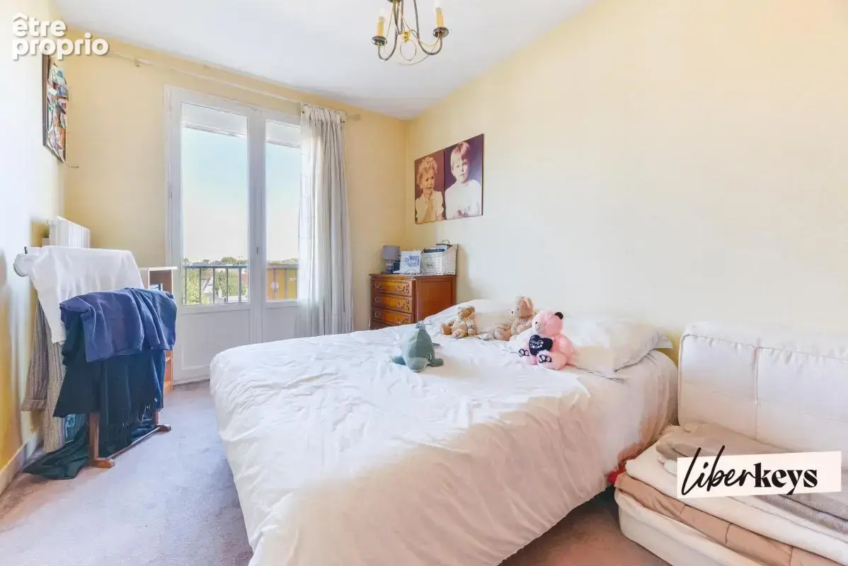 Appartement T4 de 77 m² avec balcon, cave et parking équipé - photo 7