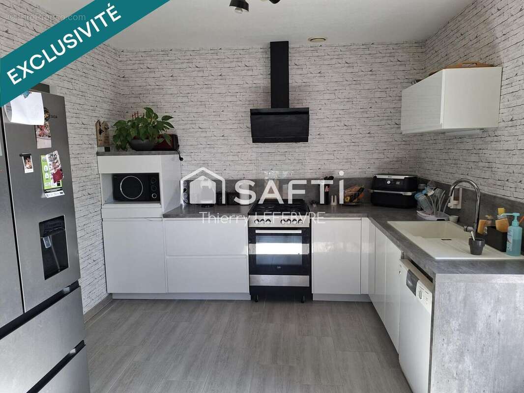 Maison 140 m² à Jaunay-Clan  - photo 3