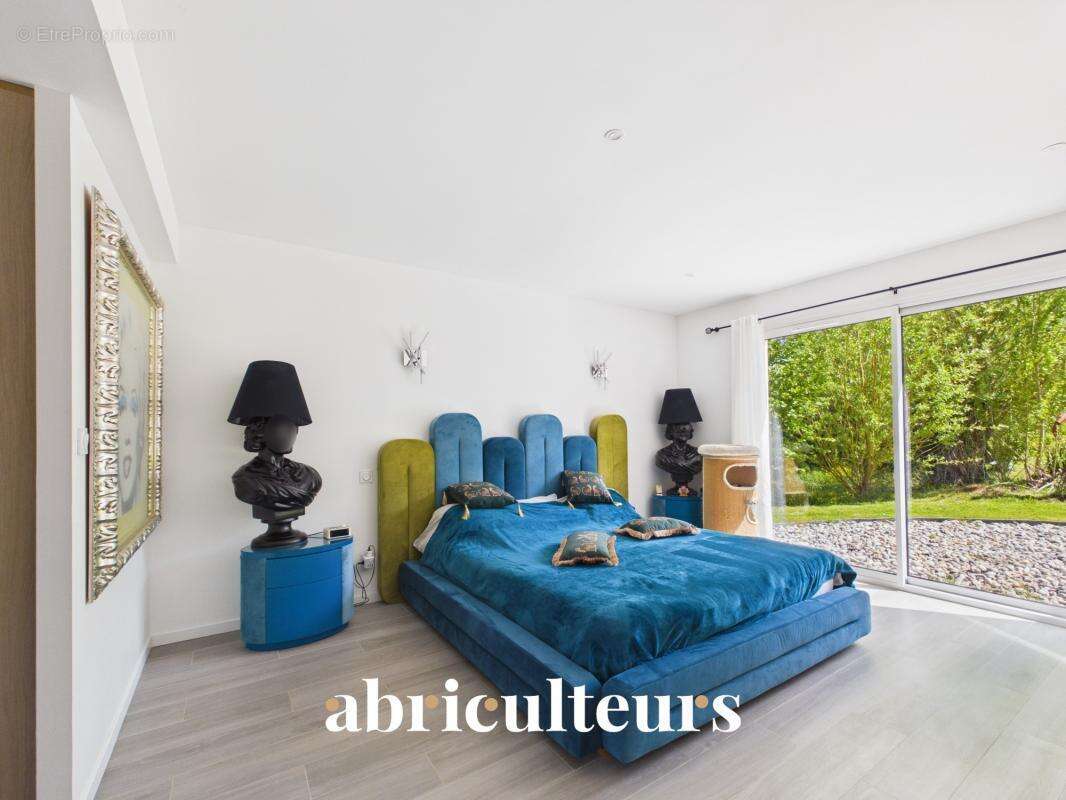 Maison d’architecte de plain-pied récente avec vue panoramique sur la nature environnante en vente à Vaugrigneuse (91640) - photo 24