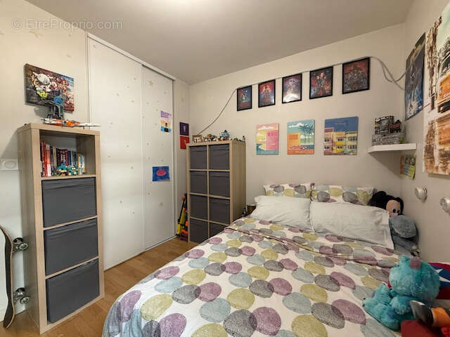Aux portes de Saint-Cyr-au-Mont-d'Or   T3 de 67 m2 en rez-de-jardin avec terrasse, garage - résidence sécurisé - photo 12