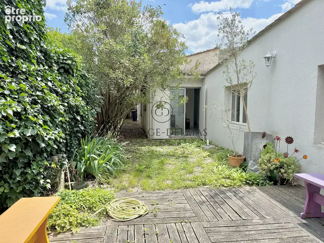 Maison de plain pied en pierre avec jardin - CROIX BLANCHE - photo 3