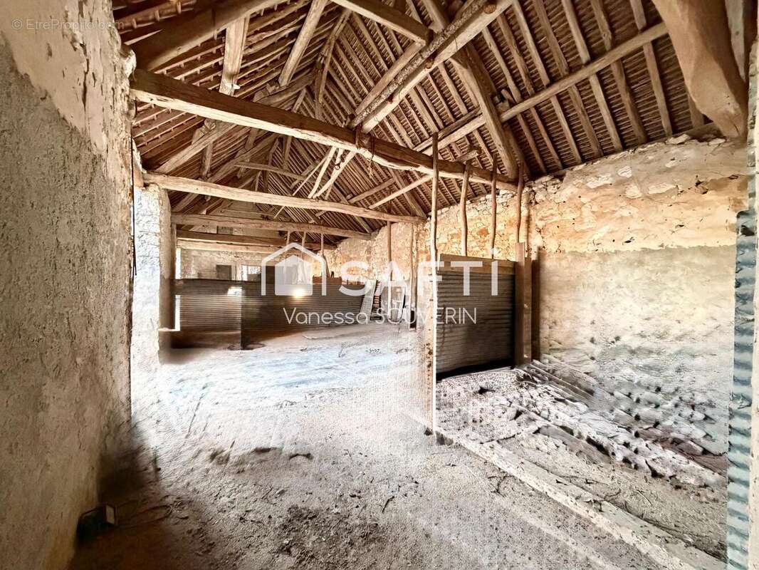 Photo 2 - Maison à LA LOUPTIERE-THENARD