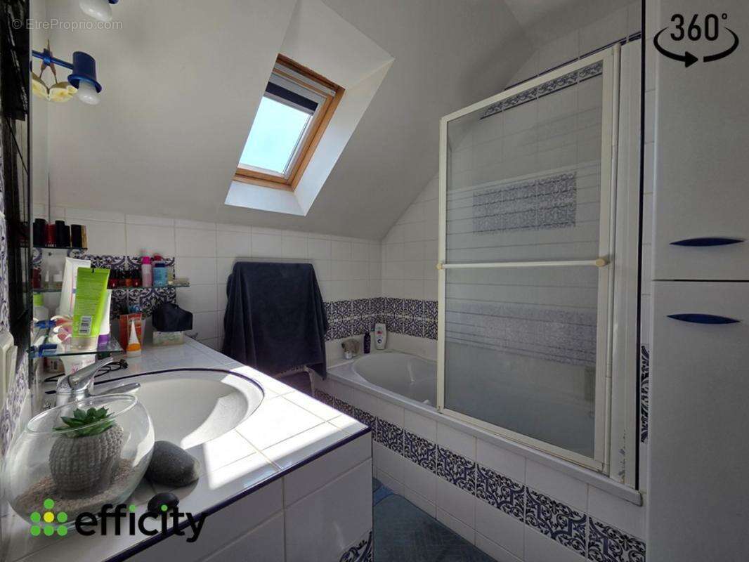 Maison 96 m² à La Chapelle-Des-Fougeretz  - photo 12