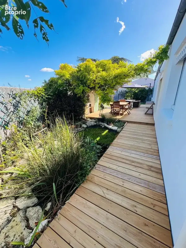 Maison familiale de plain-pied avec jardin, véranda et prestations récentes - photo 5