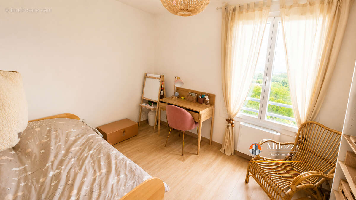 Appartement familial 113 m² avec 4 chambres, balcon, cave et garage - Villefontaine - photo 13
