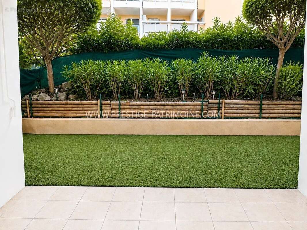 Cannes grand parc - rez de jardin - photo 6