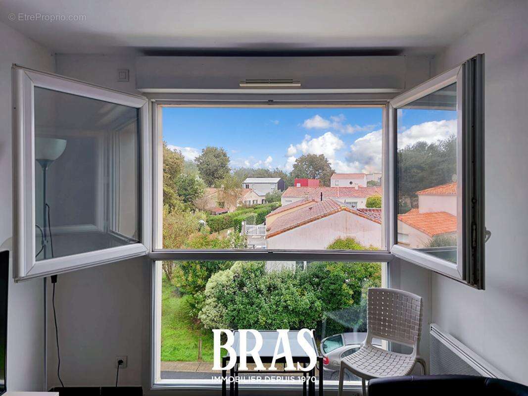 Reze - t2 avec garage - photo 6