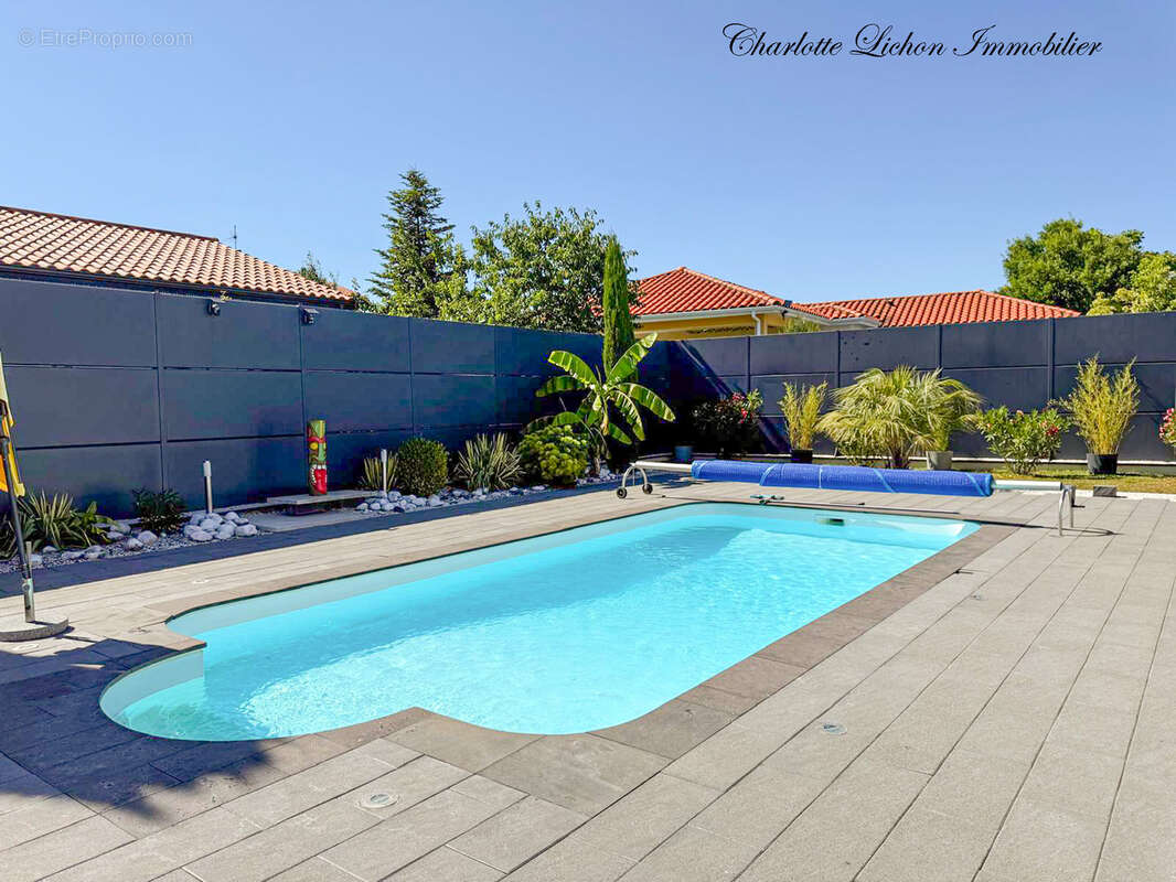 Maison 208 m2 - 292 m2 au sol - 5 chambres - véranda - garage - piscine  - cour et jardin - photo 27
