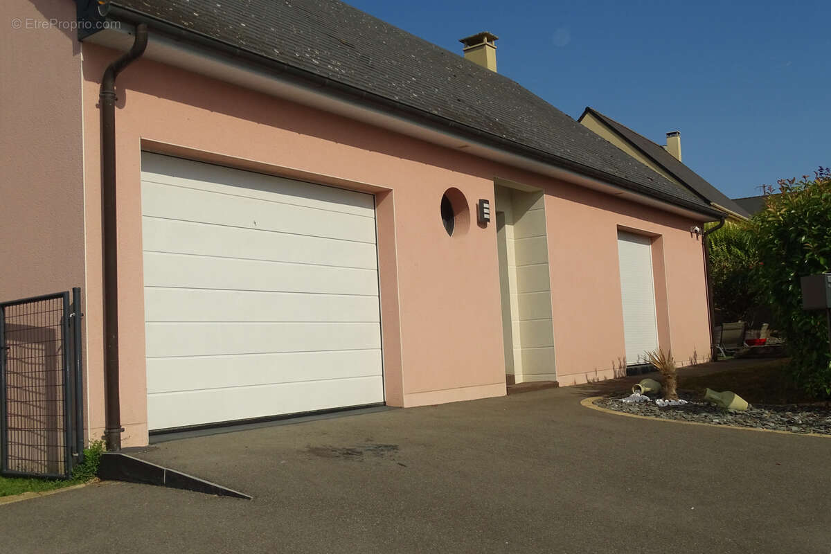 Maison de plain-pied 4 chambres avec garage - photo 2