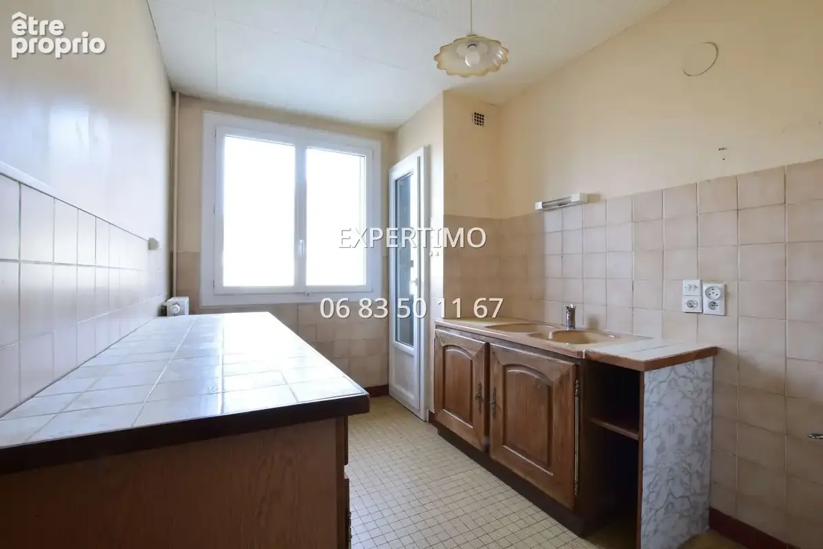 Appartement lumineux - 3 chambres poss. 4 - fort potentiel - photo 12