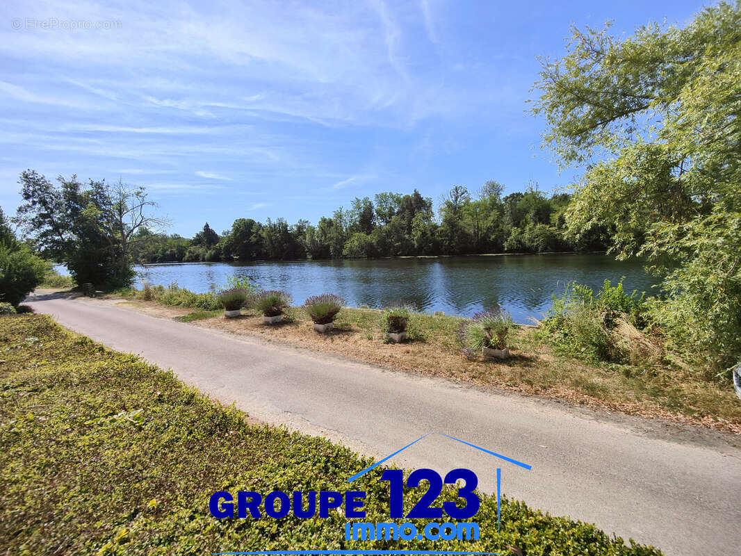 Un bien atypique avec vue sur l’Yonne et de multiples possibilités - photo 25