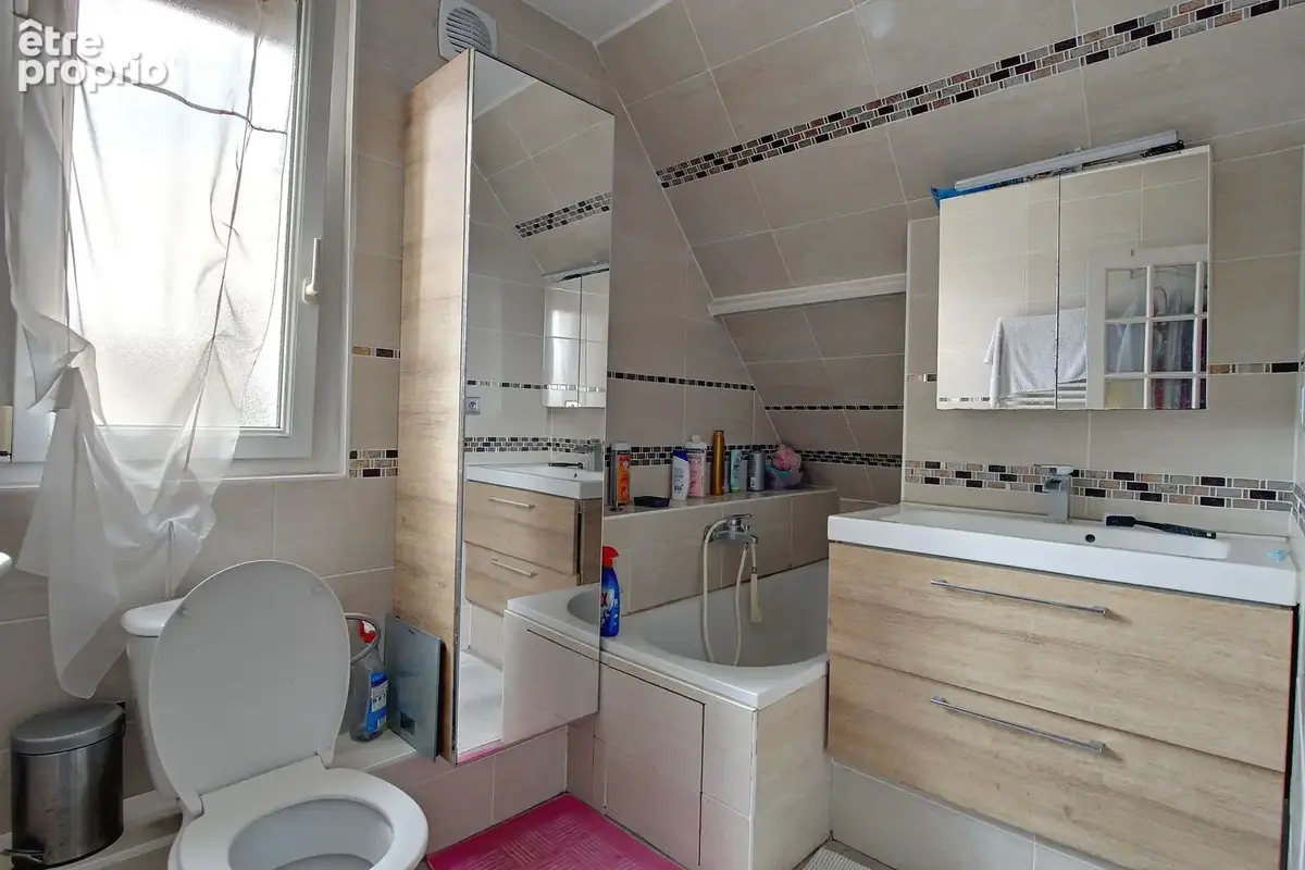 Maison 6 pièces 132 m² à vendre à Saint-Etienne-Du-Rouvray (76800) - photo 9