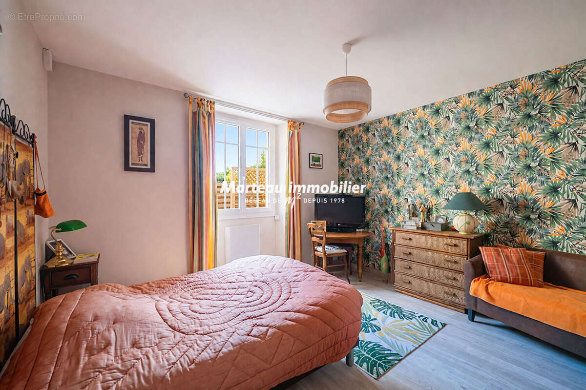 Maison à PARIGNE-L'EVEQUE