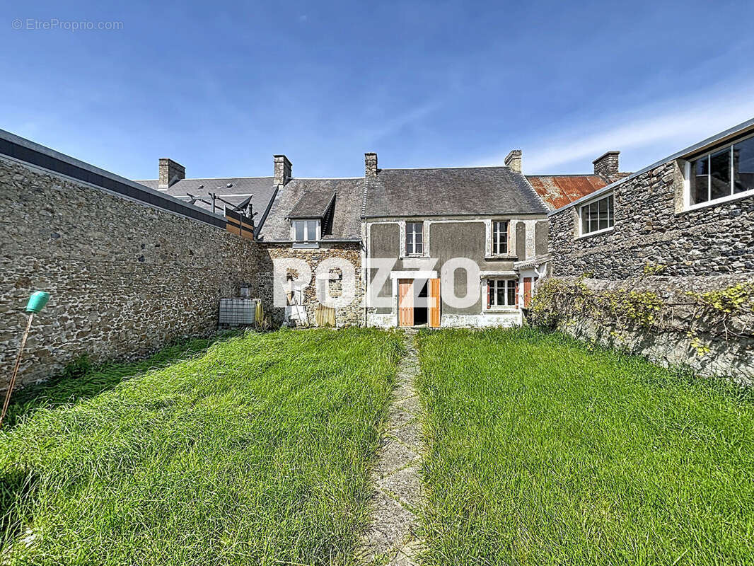 Maison à AGON-COUTAINVILLE