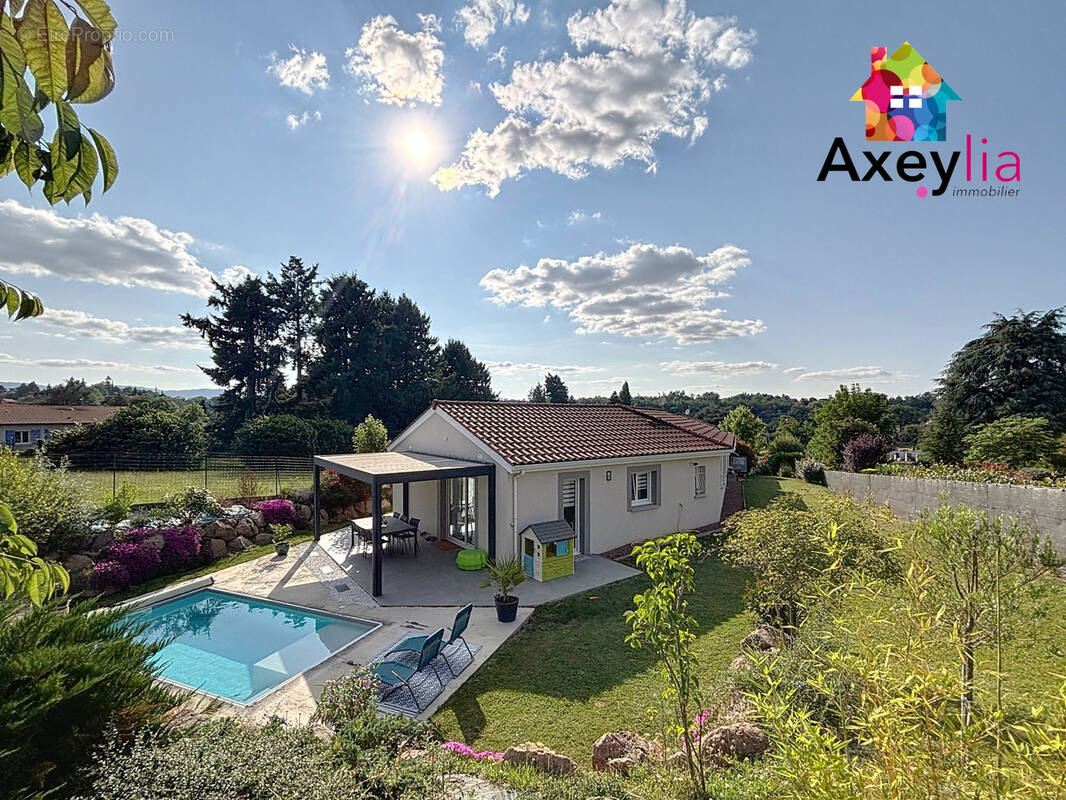 Maison à COMMELLE-VERNAY