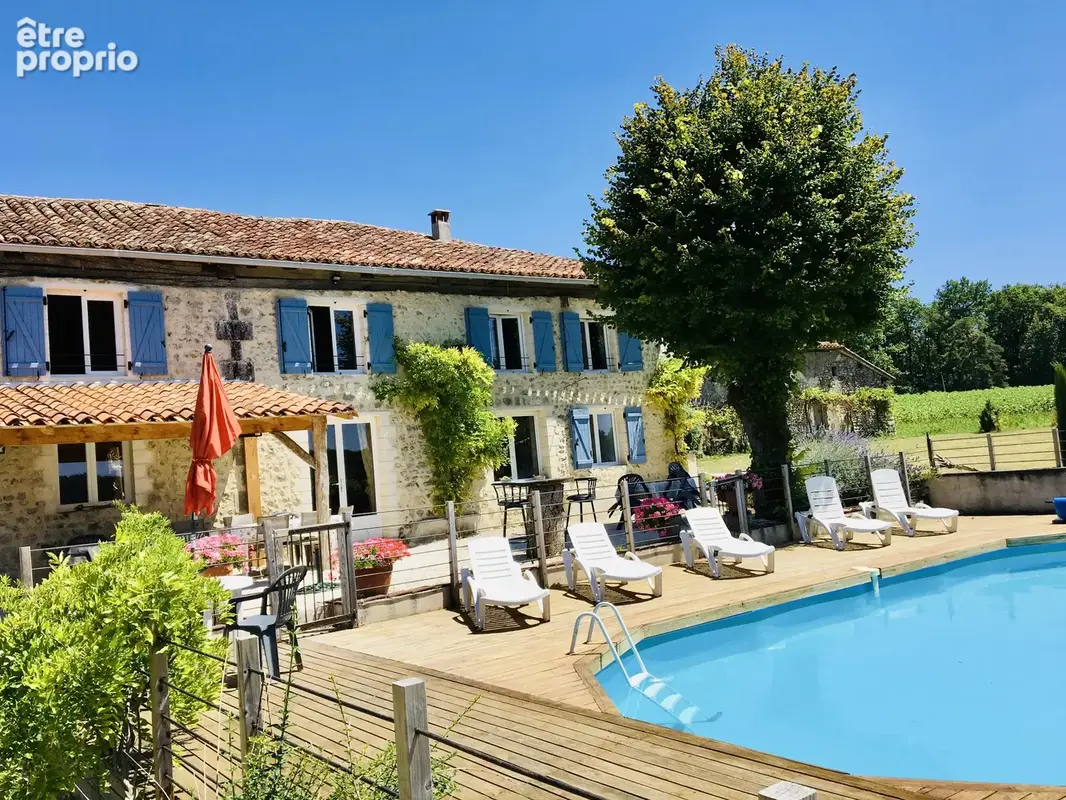 Superbe grange réaménagée avec 6 chambres et 4 salles de bains, offrant une vue imprenable - photo 20