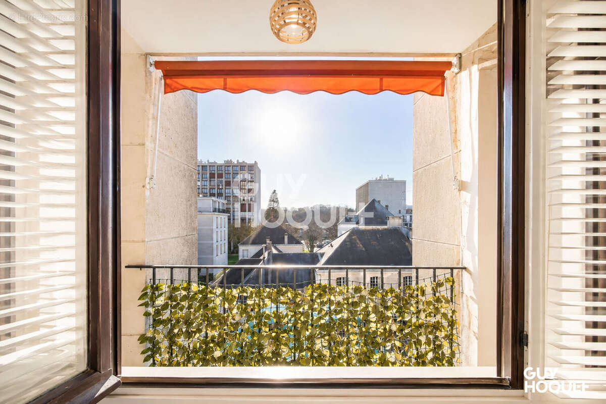 Appartement traversant de 85 m² + balcon - photo 8
